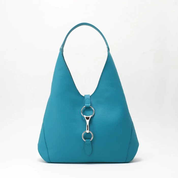 türkiz női válltáska egyedi záródással